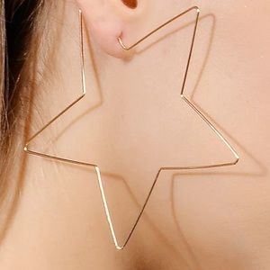 Gold open star earrings. Gold hoops.